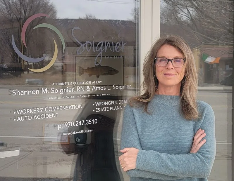 Attorney Shannon Soignier reviewing medical records and case documents